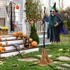Tangkula Witch With Broomstick Halloween Animatronic Life Size Animated Halloween Prop With Laughing And Screaming Sound LED Lights -Halloween Costume Store GUEST 43347e8f c161 4130 98f7 0241905bf241