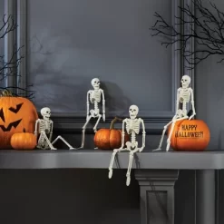 4pc 10" Skeletons Halloween Decorative Props - Hyde And EEK! Boutique™: Indoor/Outdoor, Off-White